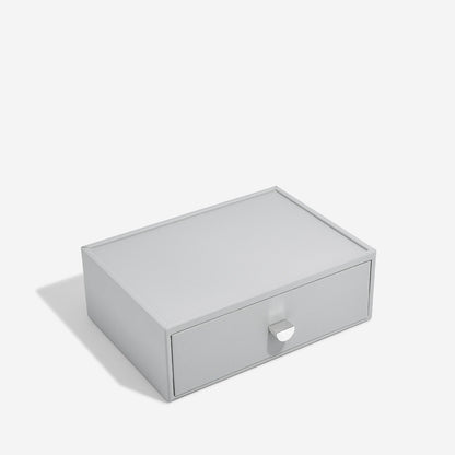pebble grey rectangular box with a pull handle drawer on a white background