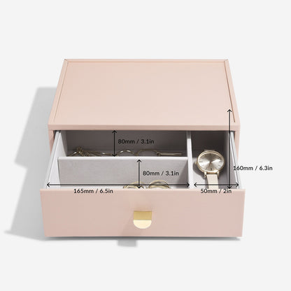 Pink jewelry box with dimensions labeled on a white background