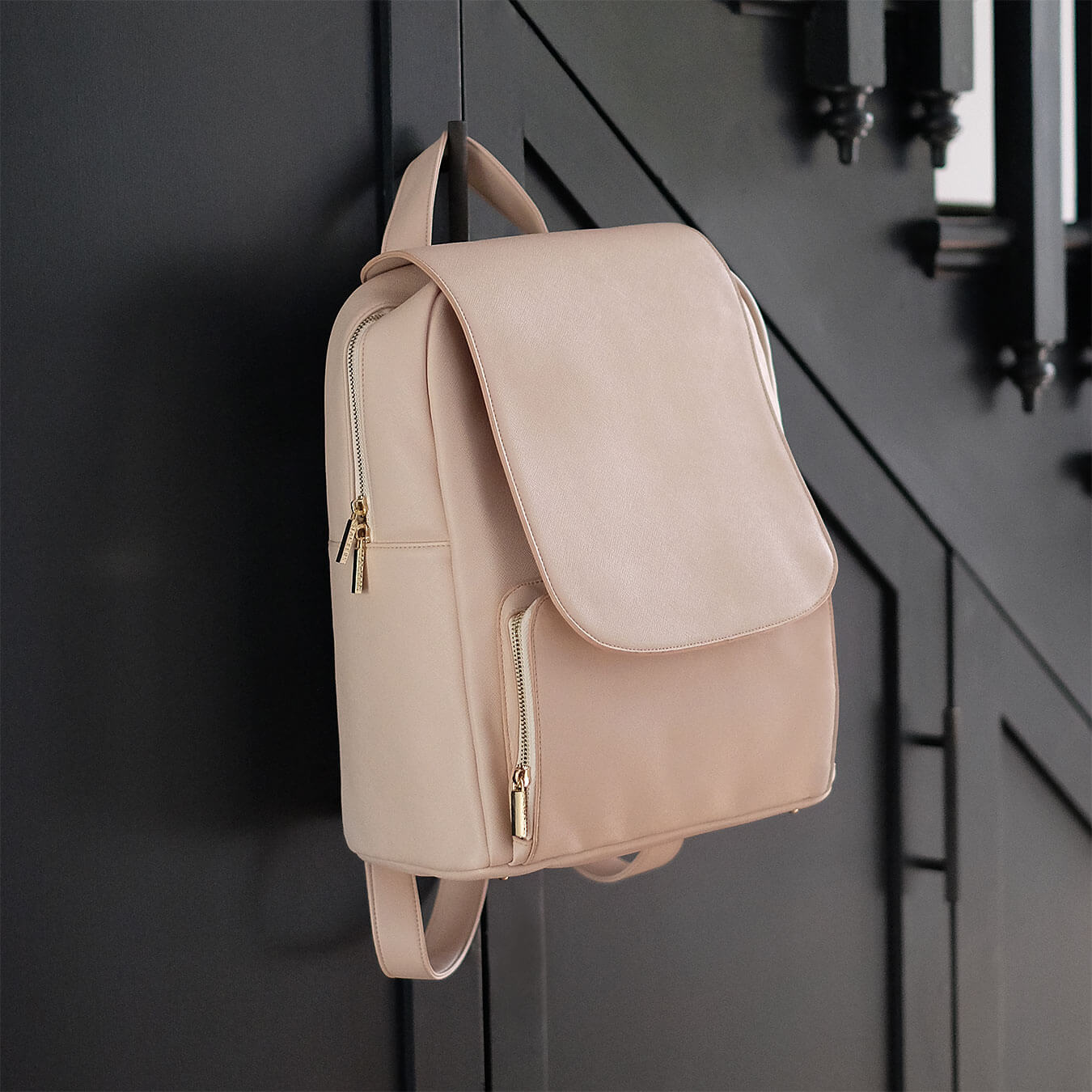 Beige leather backpack best sale